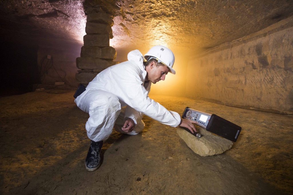 Alphaguard radon monitor from Bertin being operated by a person in a cave